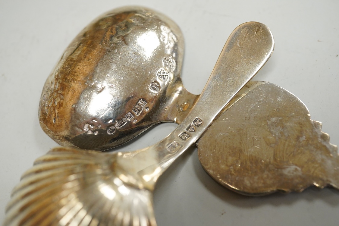 Small silver including two Edwardian caddy spoons, one German with import marks, a George V vesta case, a late Victorian pierced bonbon dish and a modern mounted steel cigar cutter.